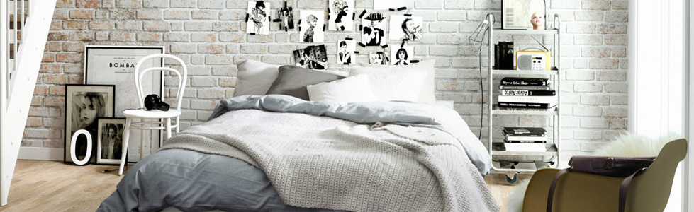 Get an industrial style home by using exposed brick walls