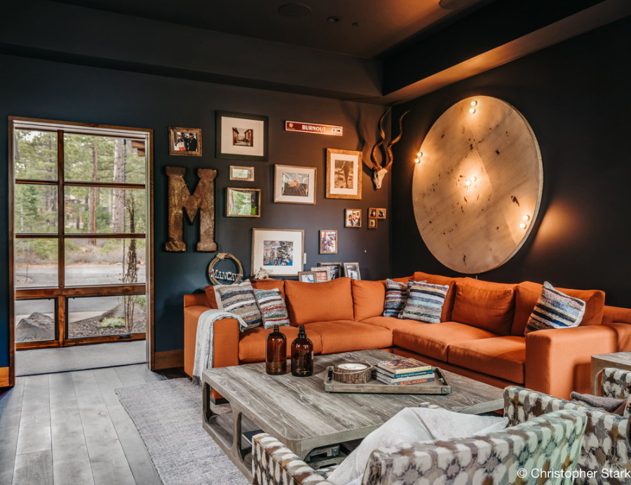 Modern living room, interiors with classe, metal details, upholstery, orange sofa