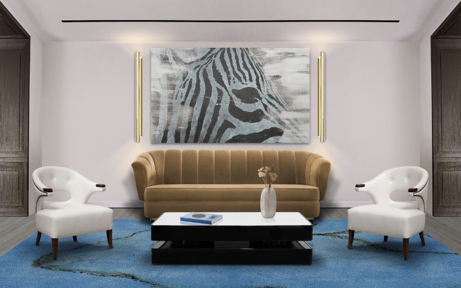 brown sofa, velvet sofa, brown velvet sofa, white leather armchair, rectangular centre table, blue rug, gold wall light