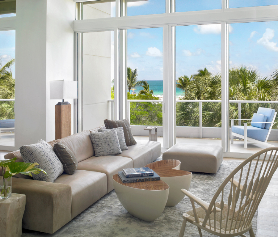 High-end Residential Projects by Michael Wolk - South Beach Townhouse . Living room in grey and a centre table inspired by floral elements