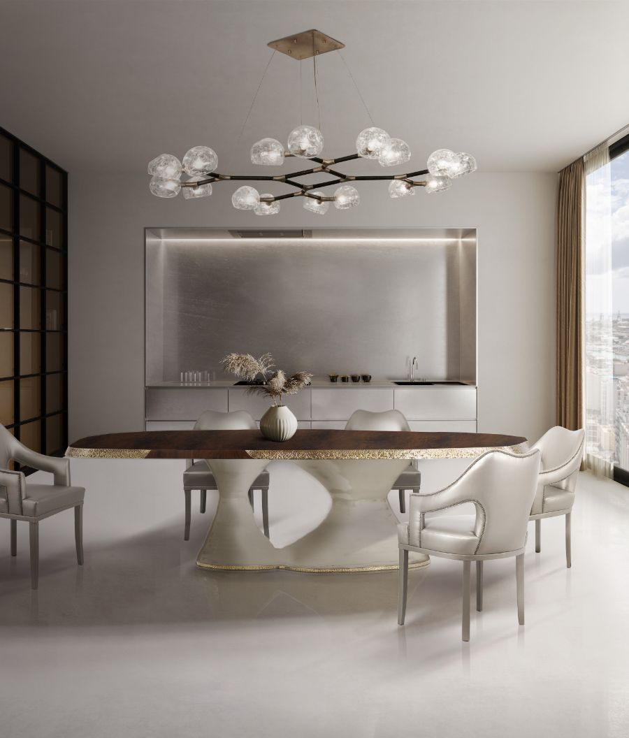 Modern Dining Room Decor in Black, White and Grey with white leather dining chair, wood rectangular dining table and glass suspension light