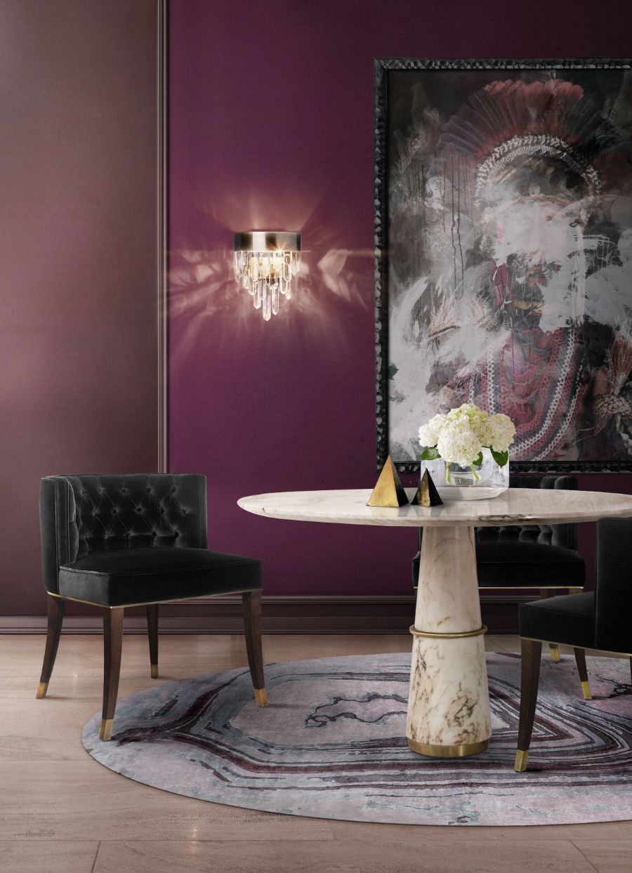 modern classic dining room with round white marble dining table and black velvet dining chair