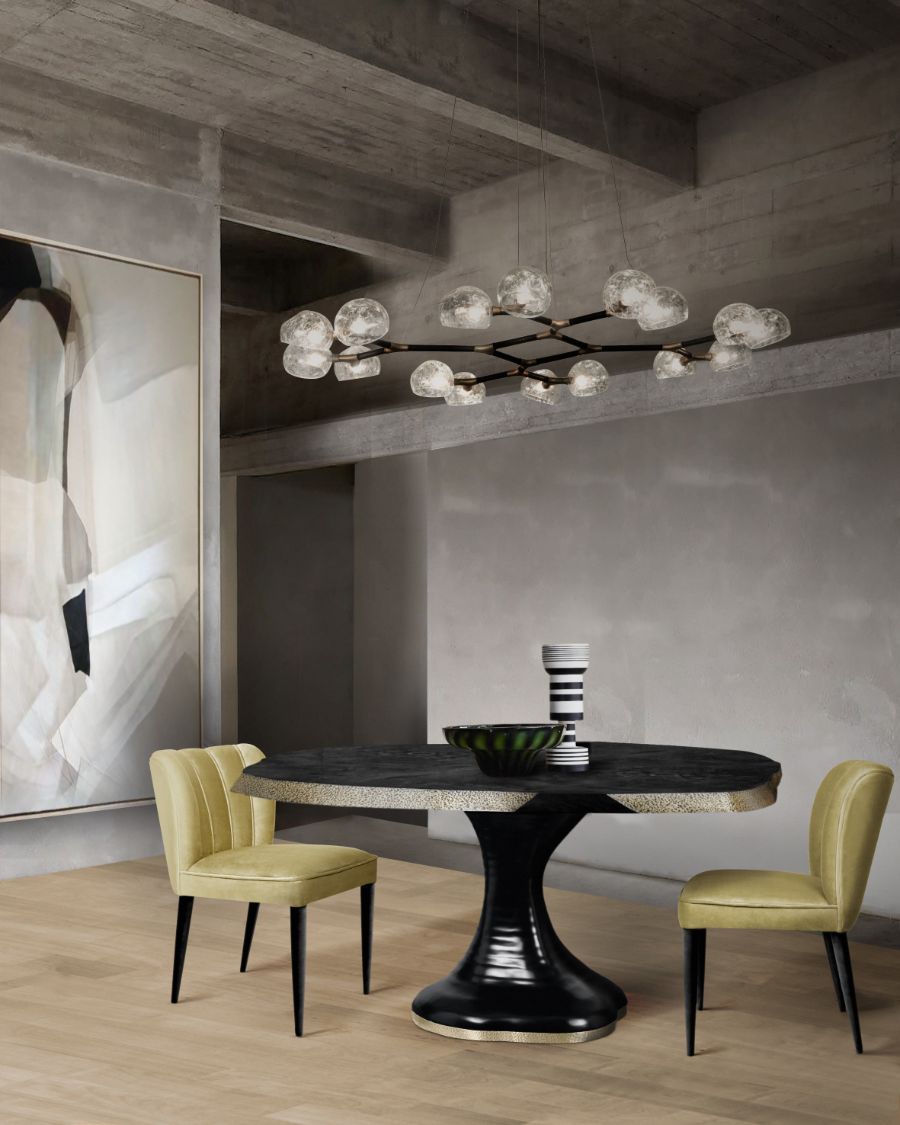 modern contemporary dining room with round wood dining table and yellow upholstered dining chairs