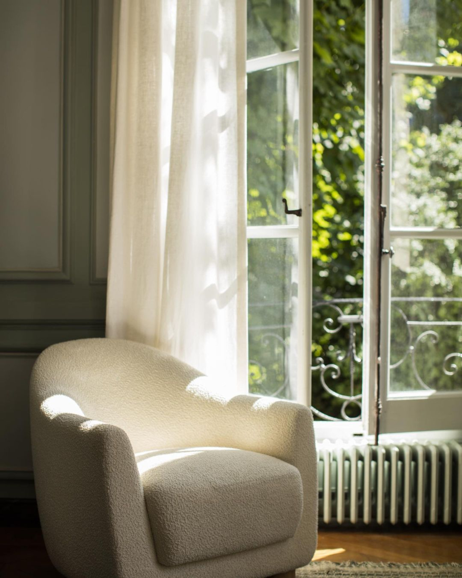 Modern Living Room Interiors from Charles Zana. Saint Germain project with neutral Reading corner in a classic living room