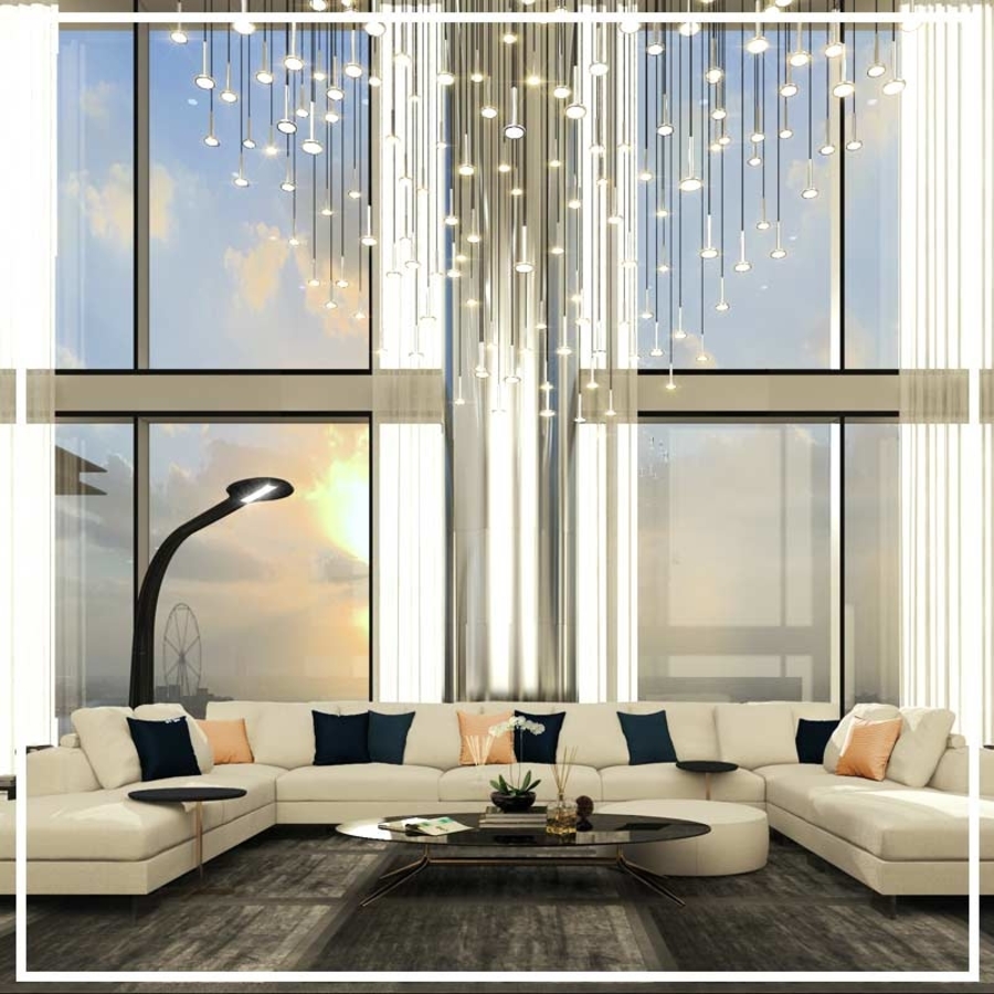 Living room with big windows complemented with a big sofa, a center tables and a dark rug.