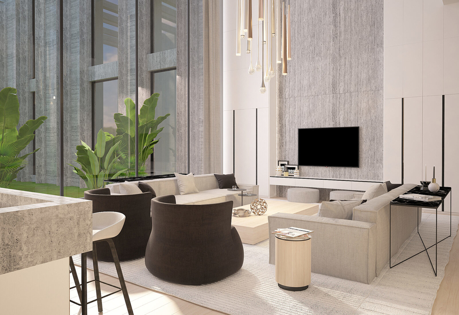 A living room with some bespoke upholstery with marble details and a custom rug.