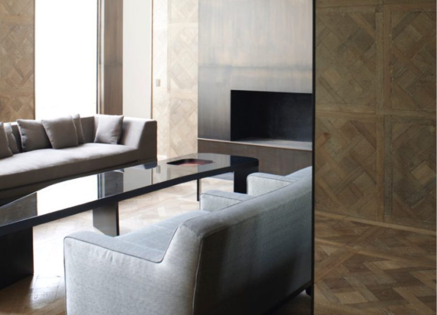 Thierry Lemaire: Modern Living Room Decor.Living room with straight, modern lines. Dark tones on the walls and furniture, as sofa, centre table and chimney.