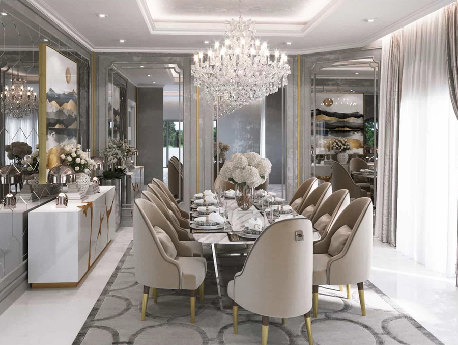 Dining room embalished with white and gold details, furnished with a custom dining table, some bespoke dining chairs and a custom sideboard.