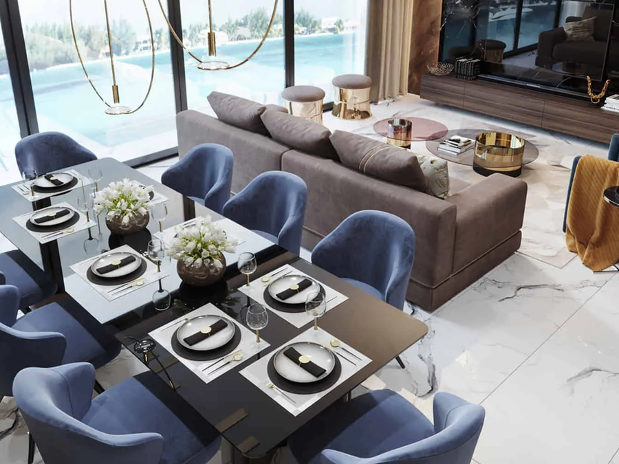 A dining room furnished with a custom dining table and some bespoke dining chairs.
