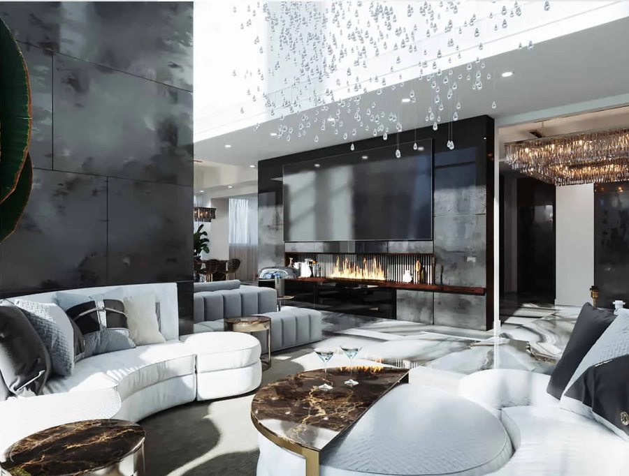 A white living room embalished with mwhite marble floors and walls, furnished with a custom center table a some bespoke sofas.