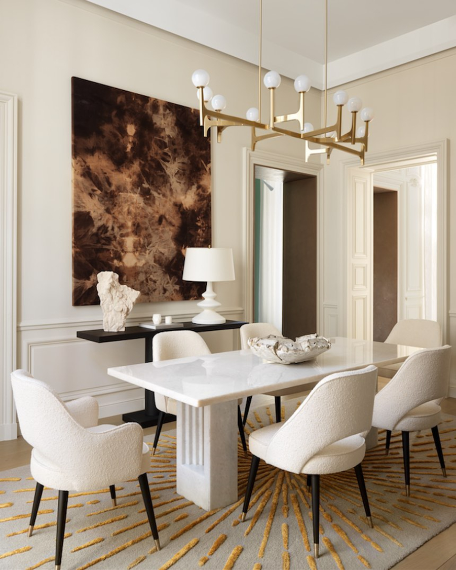 Damien Langlois-Meurinne presents Modern Interior Designs. Damien Langlois-Meurinne has again used various materials and textures, from the marble on the dining table, the upholstered chairs and the modern accessories.