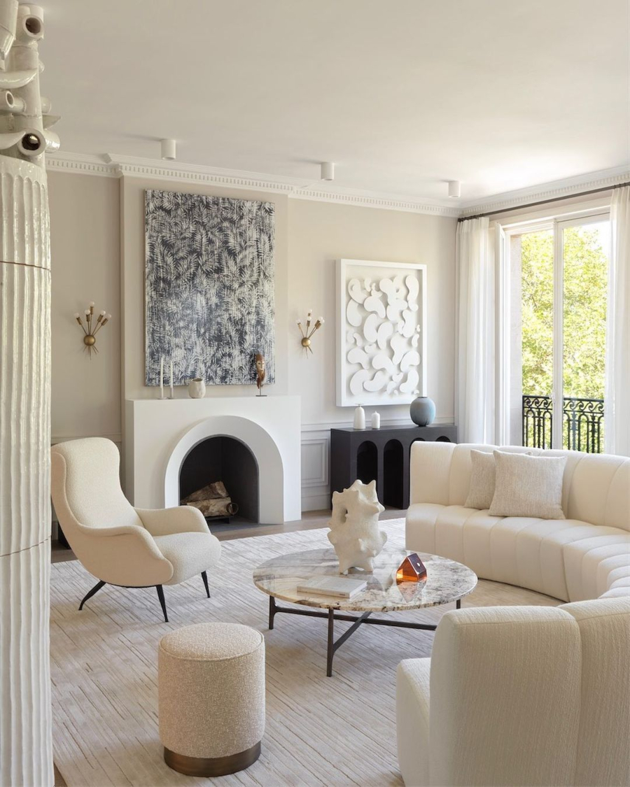 Damien Langlois-Meurinne presents Modern Interior Designs. Living room with neutral tones and points of colour, preferably blue as are present in the artwork. 