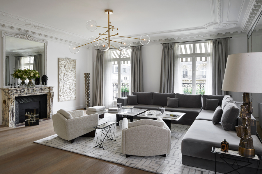 Modern Interior Design by Stéphanie Coutas. his apartment opens onto lovely reception rooms with amazing views of the capital's most attractive avenues, and is decorated in a contemporary Parisian style with a great work of mouldings and a white marble fireplace.