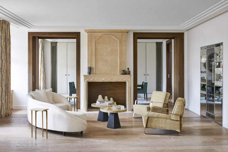 Modern Interior Design by Stéphanie Coutas. modern living room with a contemporary sofa, two gold armchairs