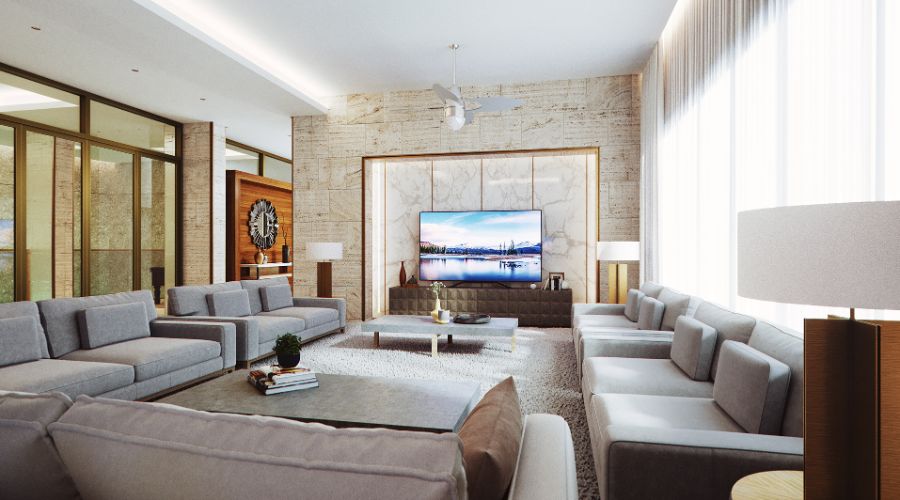 NP Designs creates a spacious living room with grey couchs.