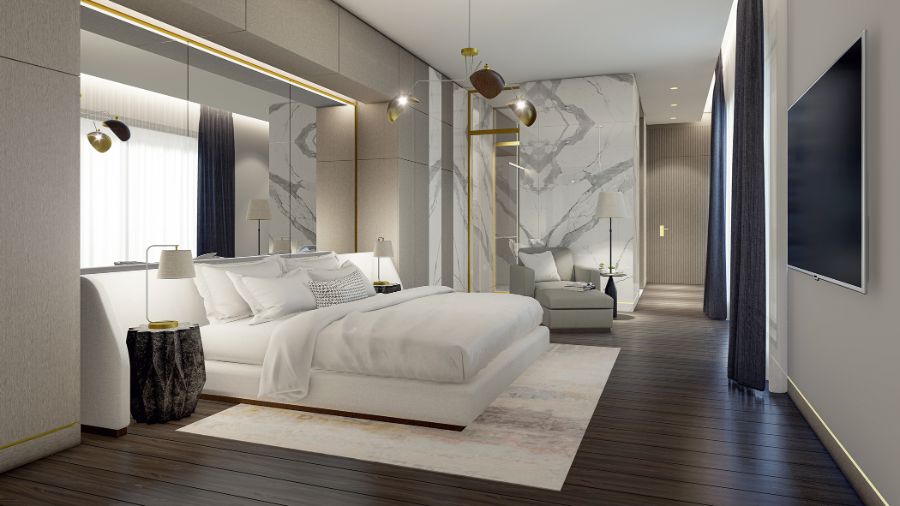NP Designs creates a withe bedroom with a big mirror on top of the bed and an armchair in the corner of the room.