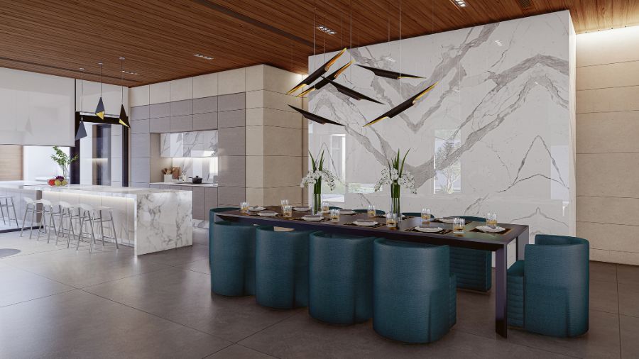 NP Designs designed a living room with blue dining chairs and a unique chandelier in the middle of the table.