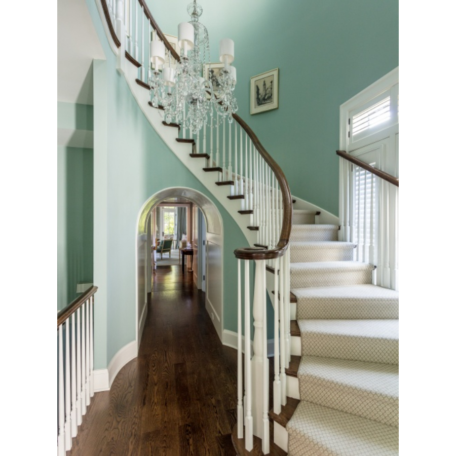 Modern Interior Design: This tall entrance gives you access to the stairs to get to the first floor, and it also takes you through a corridor to get to the living room