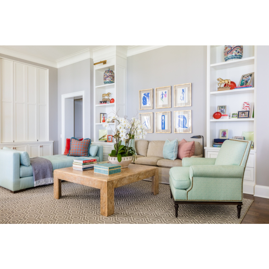 Modern Interior Design: In this living room you have 3 different sofas with three different colors, the center table matches the color of the rug