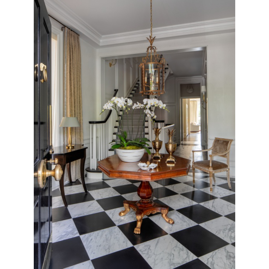 Modern Interior Design: An elegant interior design, the black and white tiles give a nice contrast to the white walls, the table matches the chair and the lights