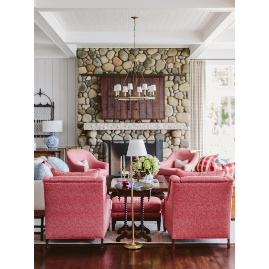 Modern Interior Design: This living room transpires the soul of this project, the stone wall gives such an unusual look to this room, the rosy sofas bring some color to complete this interior design