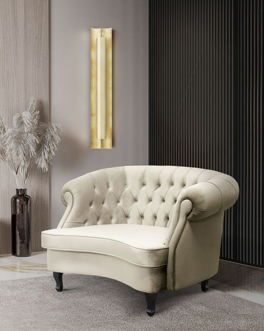neutral library design with white single chesterfield sofa