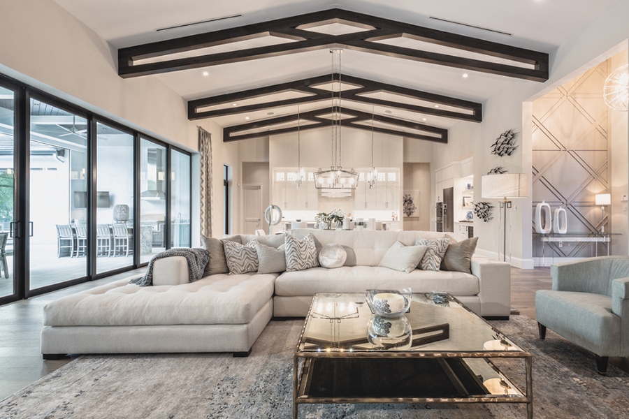 Whether in the living room, kitchen, or bathroom, the entire design is done in white and pastel tones, with each area being beautifully illuminated and providing a complete retreat for its residents.