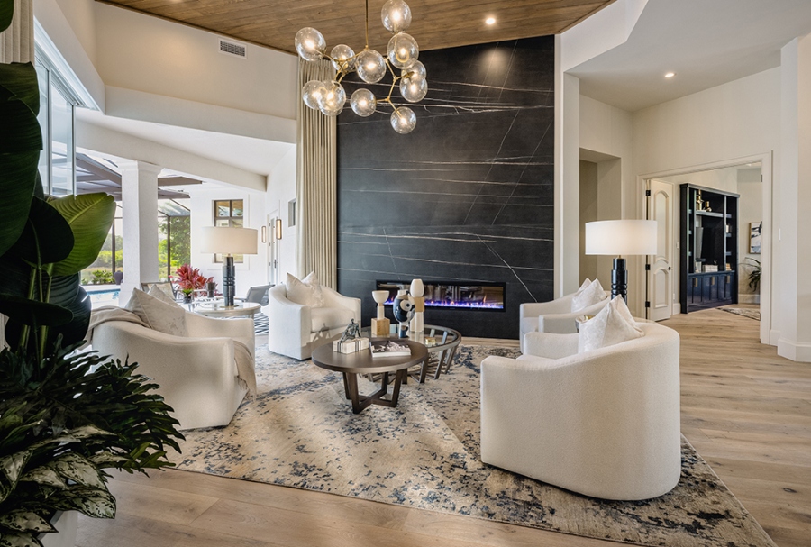We have a unique and elegant style throughout the house, blending grey and white. Clive Daniel Home additionally used unusual lamps to emphasise the mansion's opulence.