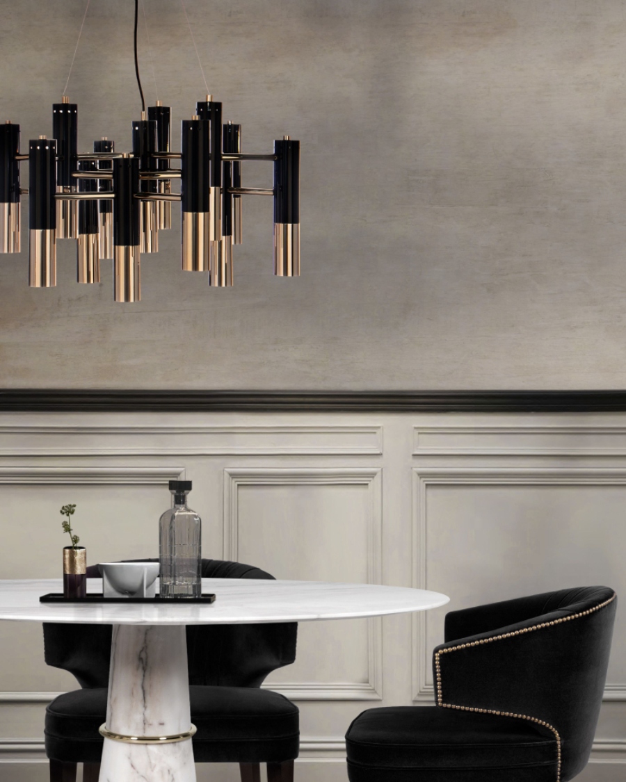 brabbu contemporary modern interior design chicago black armchair velvet gold accents white marble table black gold brass ceiling light donna mondi