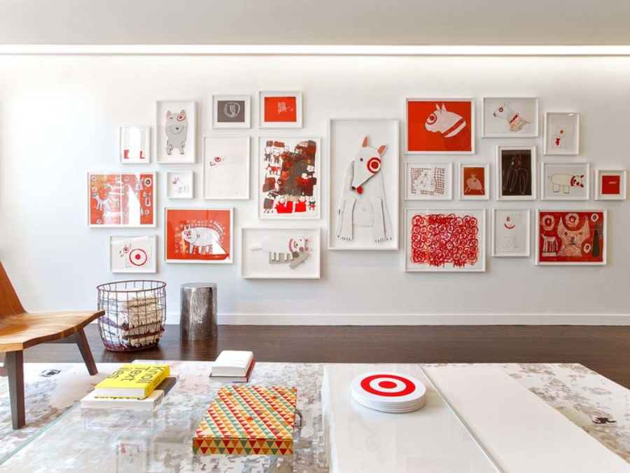 Rottet Studio: Architecture And Design In Texas. There's a lot of frames on the wall, representing the brand and its color (red).