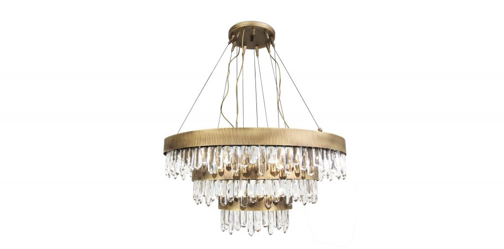 NAICCA Chandelier inspired by Mexico’s Giant Crystal Cave, with brushed brass and Quartz diffuser, enhancing luxury and contemporary living room design.