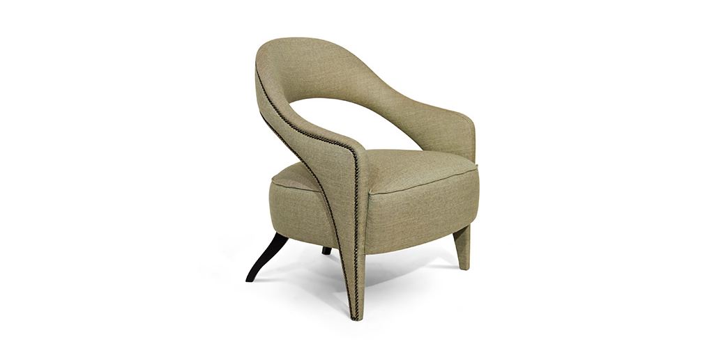 TELLUS Bold Armchair in twill with nailhead trim and matte lacquered legs, adding elegance, sophistication, and comfort to modern office design.