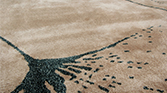 MACUSHI | Rectangular Wool Rug with Flower Patterns by BRABBU