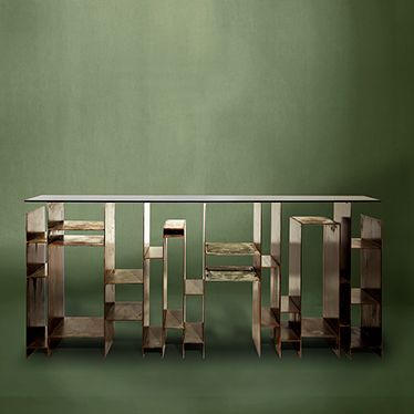 A modern home decor masterpiece born in Beijing´s skyline. The astonishing KYAN console is an edgy and strong piece created to take the cosmopolitan style of urban tribes into your modern home decor. Made from iron with acid reaction ﬁnish this modern con